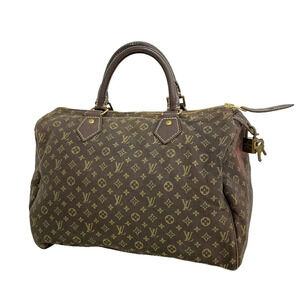 Louis Vuitton Speedy Monogram Canvas Leather Duffle Bag Brown